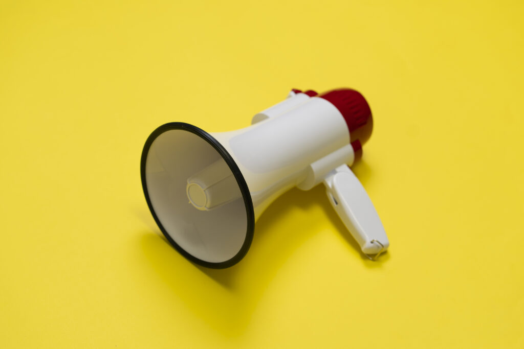 a megaphone on a yellow background